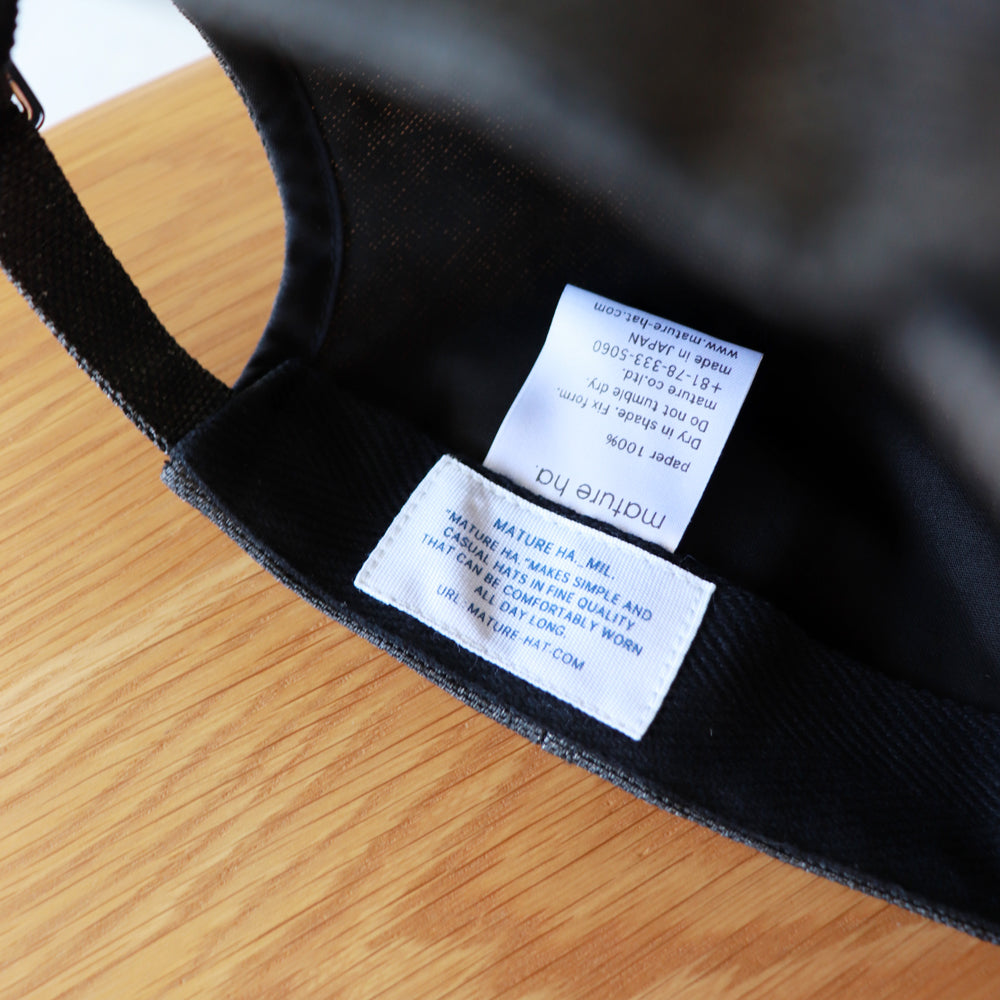 MATURE HA._MIL trainer cap / paper washed
