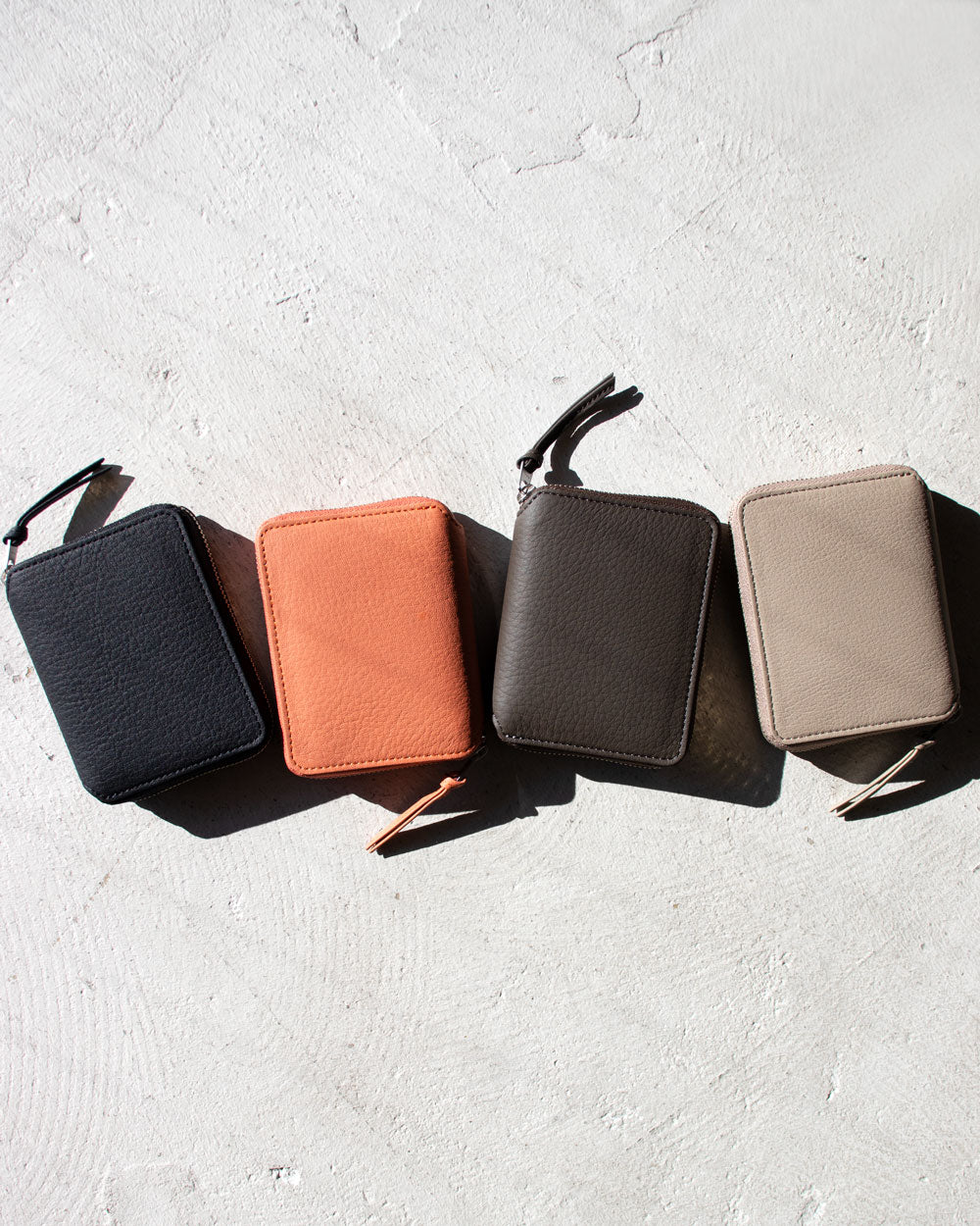 ERA. EO SHIRINK ROUND PALM WALLET