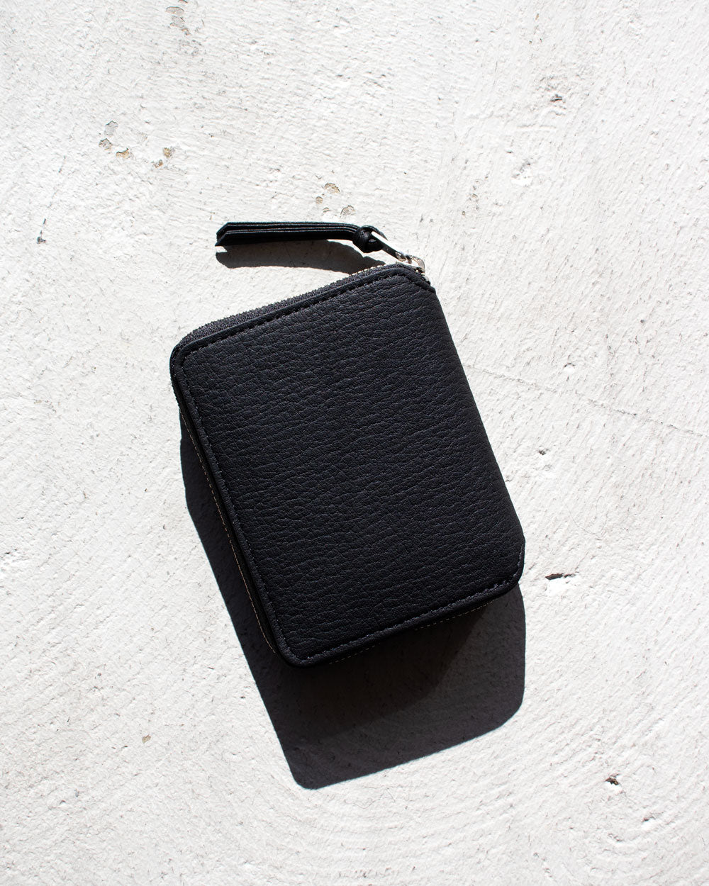 ERA. EO SHIRINK ROUND PALM WALLET