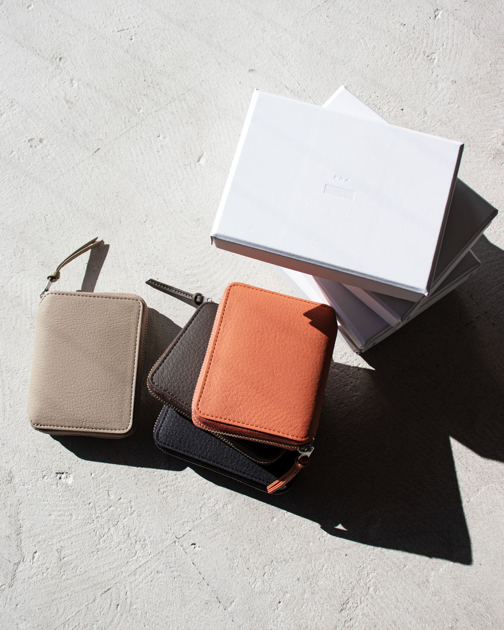 ERA. EO SHIRINK ROUND PALM WALLET
