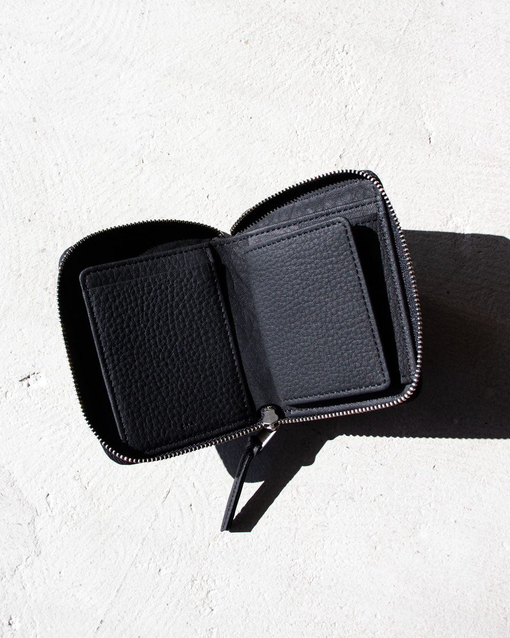 ERA. EO SHIRINK ROUND PALM WALLET