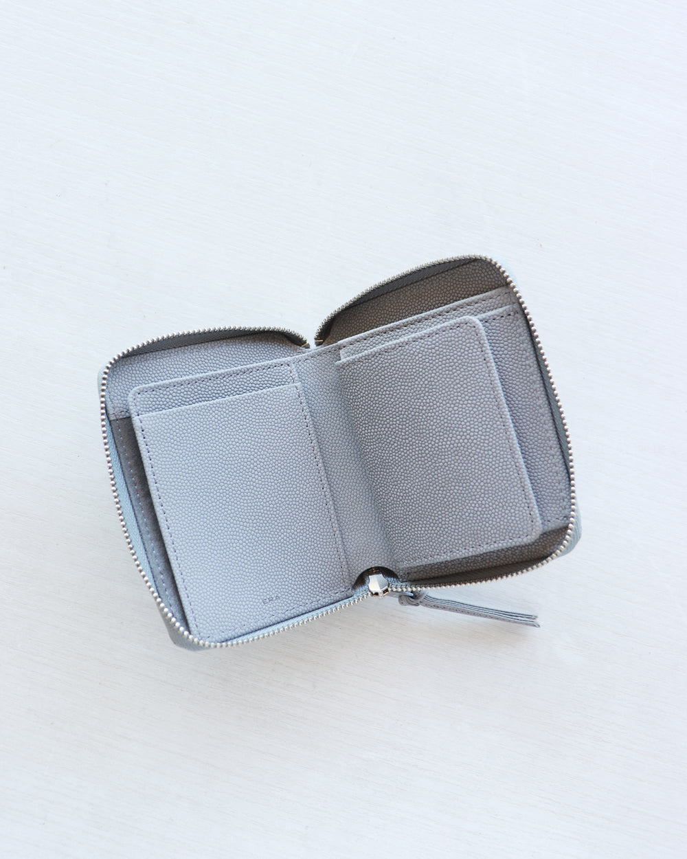 ERA. NEW VINTAGE ROUND PALM WALLET